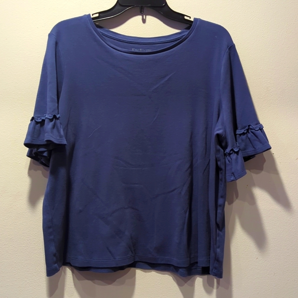 Kim Rogers flared sleeve shirt.‎